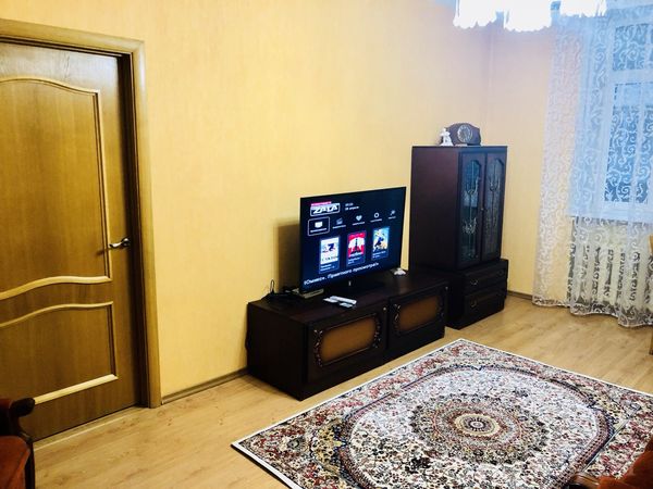 Гостиная с телевизором в современном дизайне
