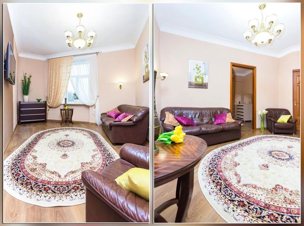 Гостиная с коричневыми кожаными диванами, ковром с узором, телевизором и зелёным растением у окна.